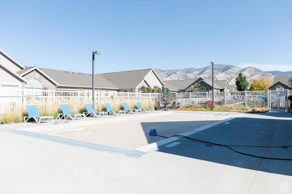 View of pool with a mountain view