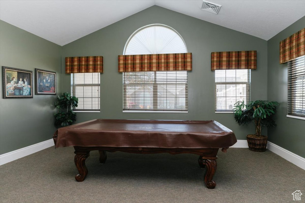 Playroom with vaulted ceiling, carpet, baseboards, and billiards