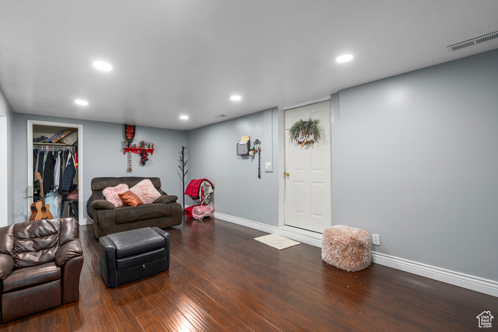 Living room featuring dark hardwood / wood-style floors