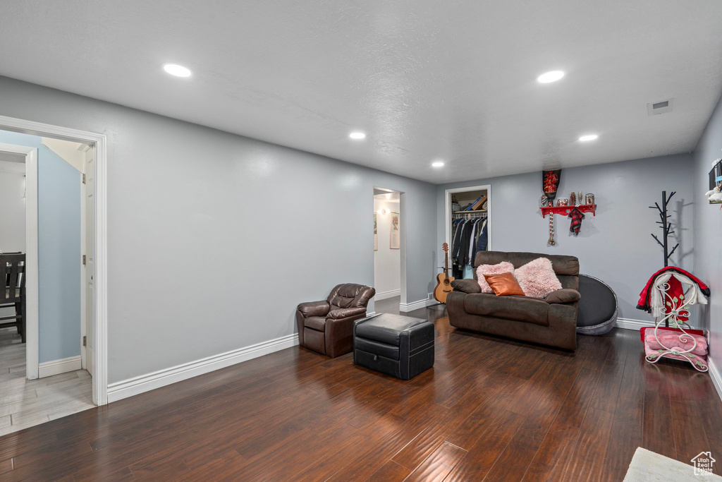 Living room featuring wood-type flooring