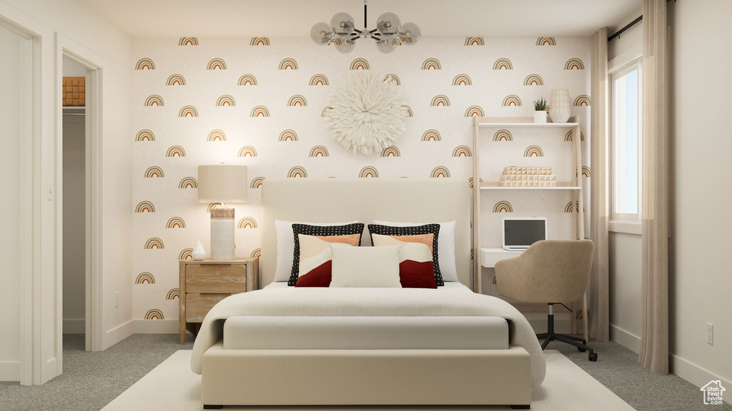 Carpeted bedroom featuring an inviting chandelier