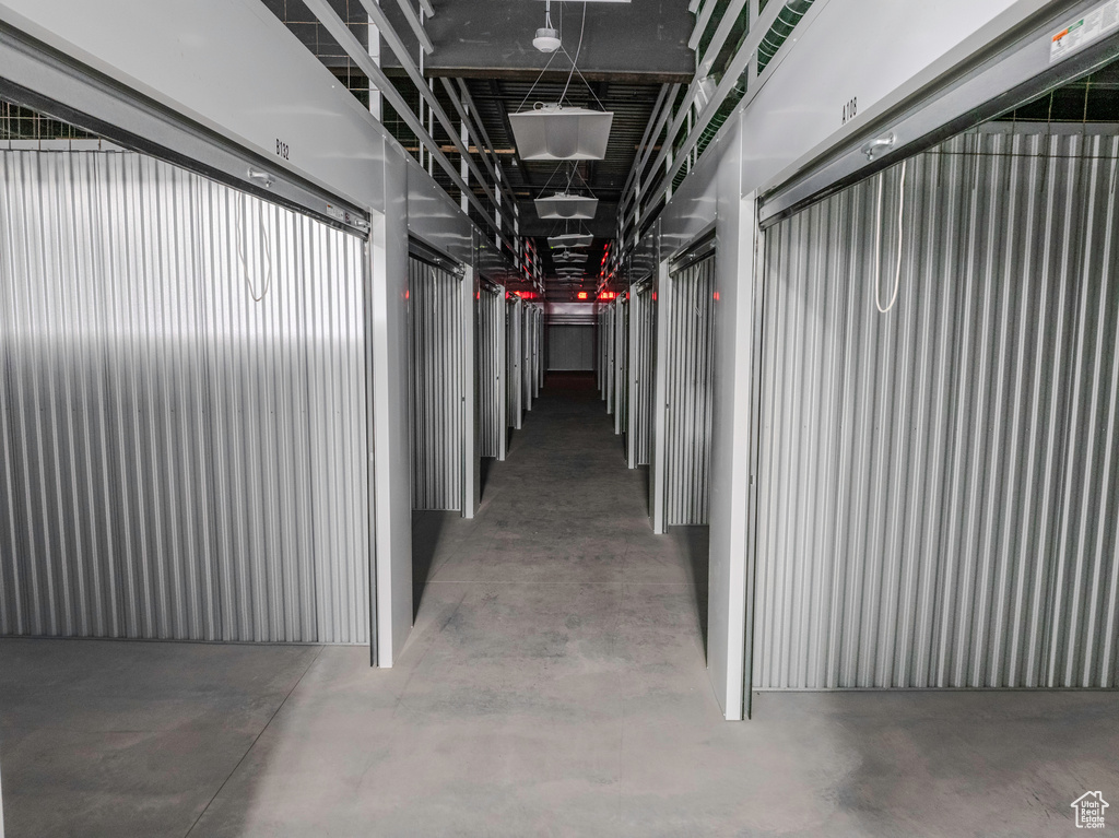 Hallway with concrete flooring