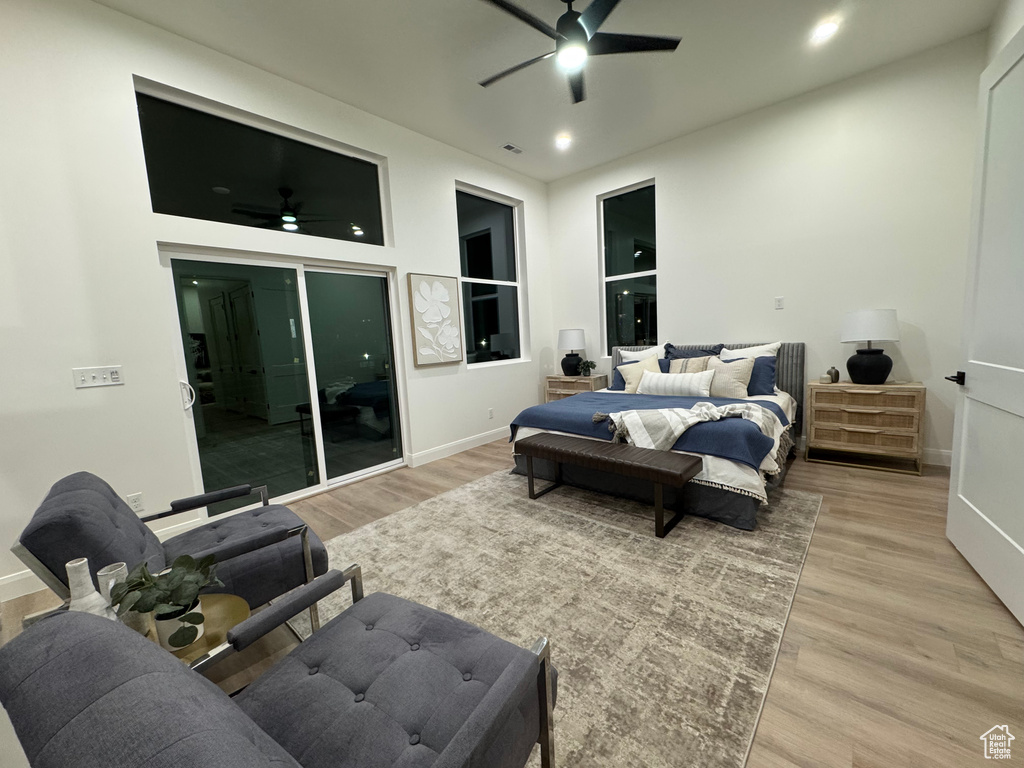 Bedroom featuring hardwood / wood-style flooring and ceiling fan