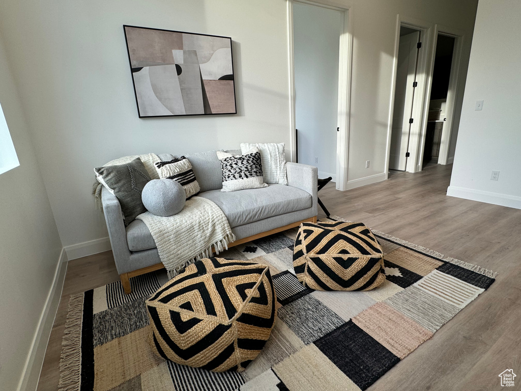 Living room featuring hardwood / wood-style flooring