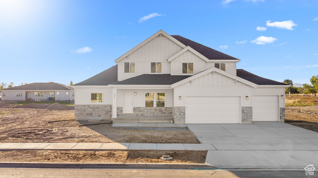 View of front of home featuring a garage