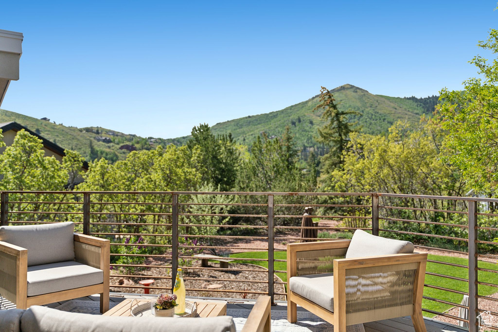 Balcony with a mountain view and an outdoor living space