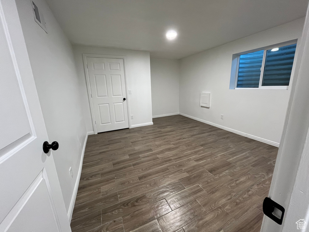 Interior space featuring dark wood-type flooring