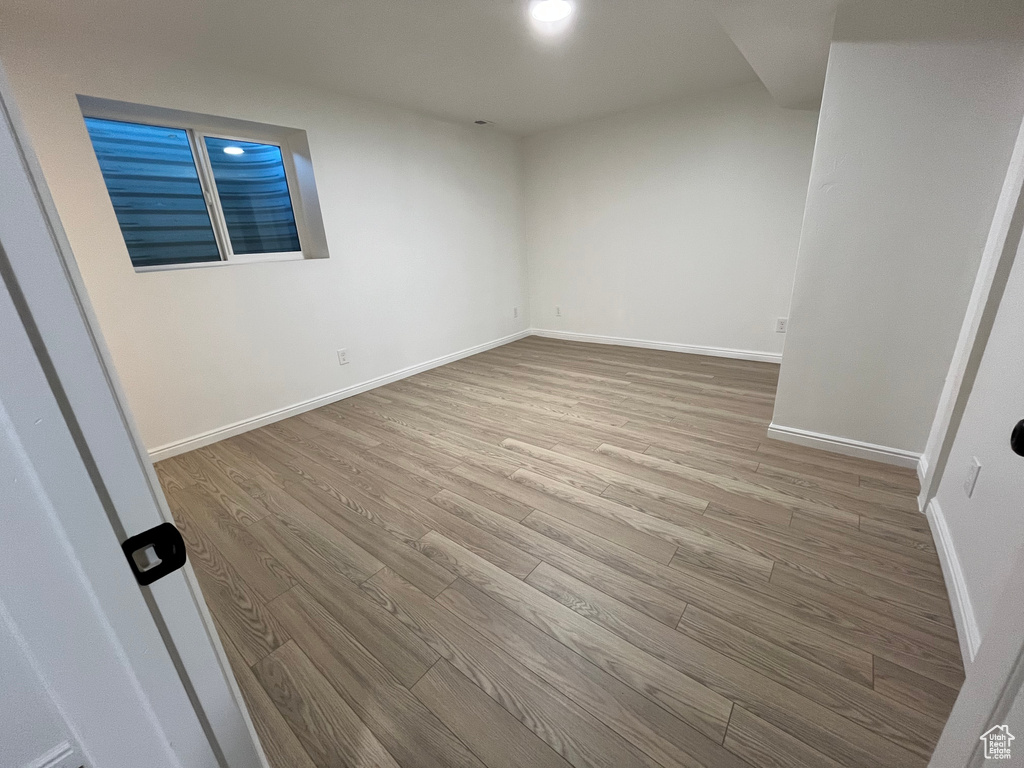 Empty room featuring light hardwood / wood-style flooring