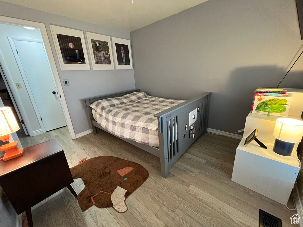 Bedroom featuring light hardwood / wood-style flooring