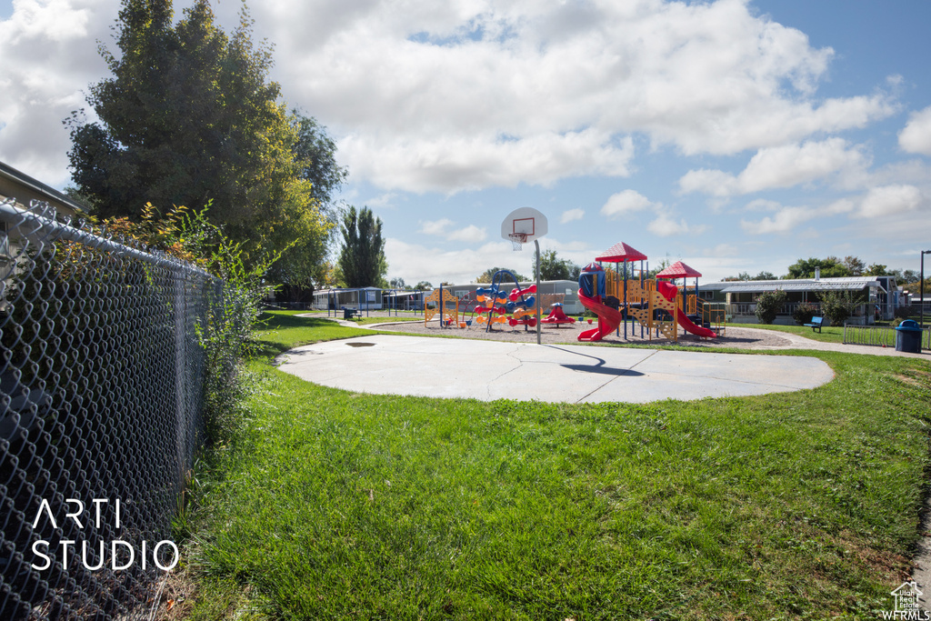 View of playground with a yard