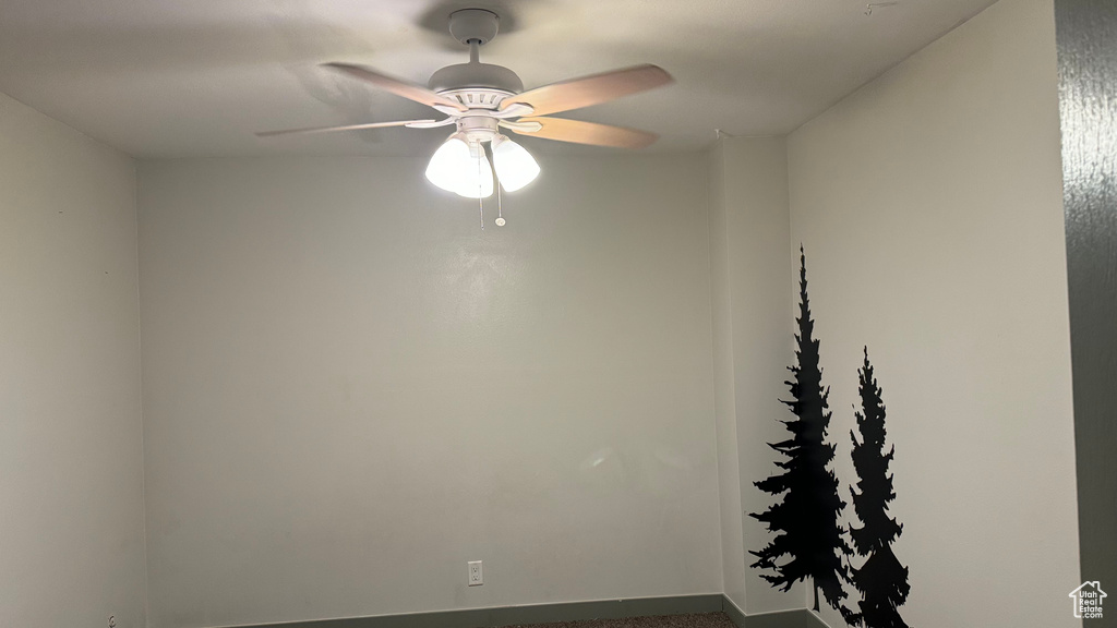 Unfurnished room featuring ceiling fan