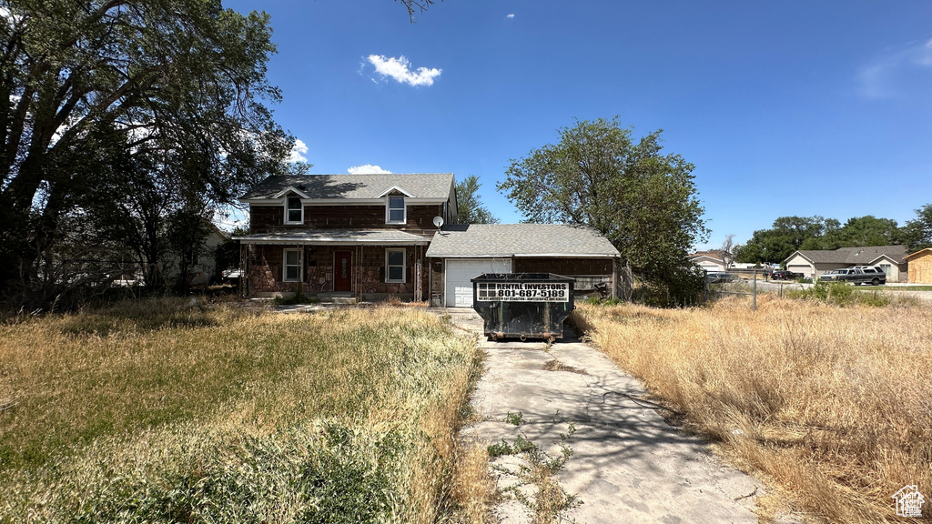 View of front of home with a garage