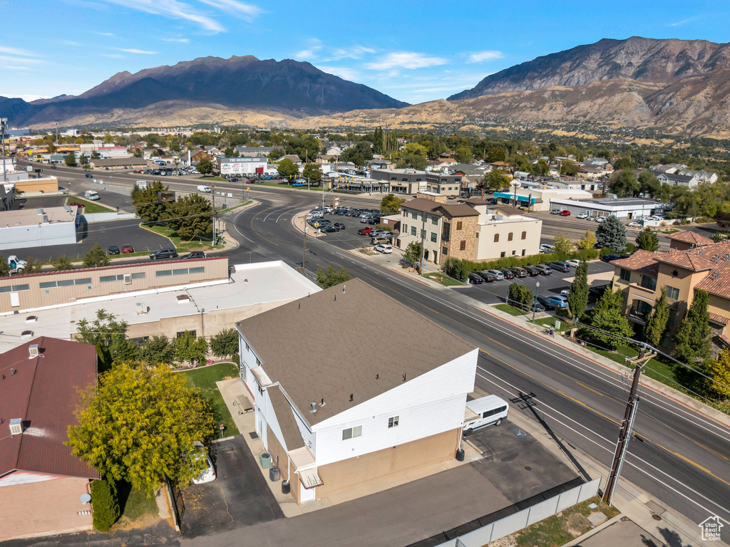 Birds eye view of property with a mountain view
