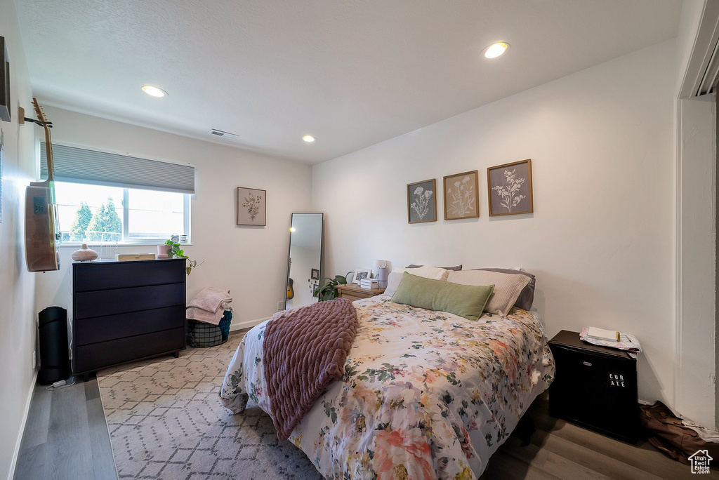 Bedroom featuring light wood-type flooring