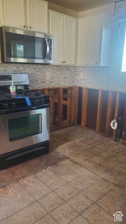 Kitchen with stainless steel appliances