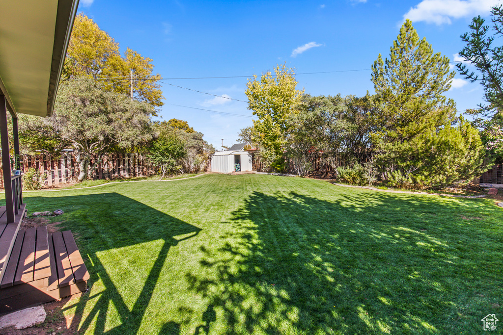 View of yard with a deck