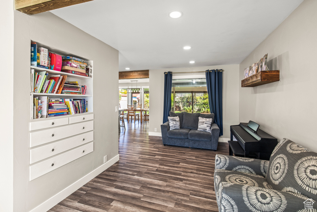 Living area featuring dark hardwood / wood-style flooring