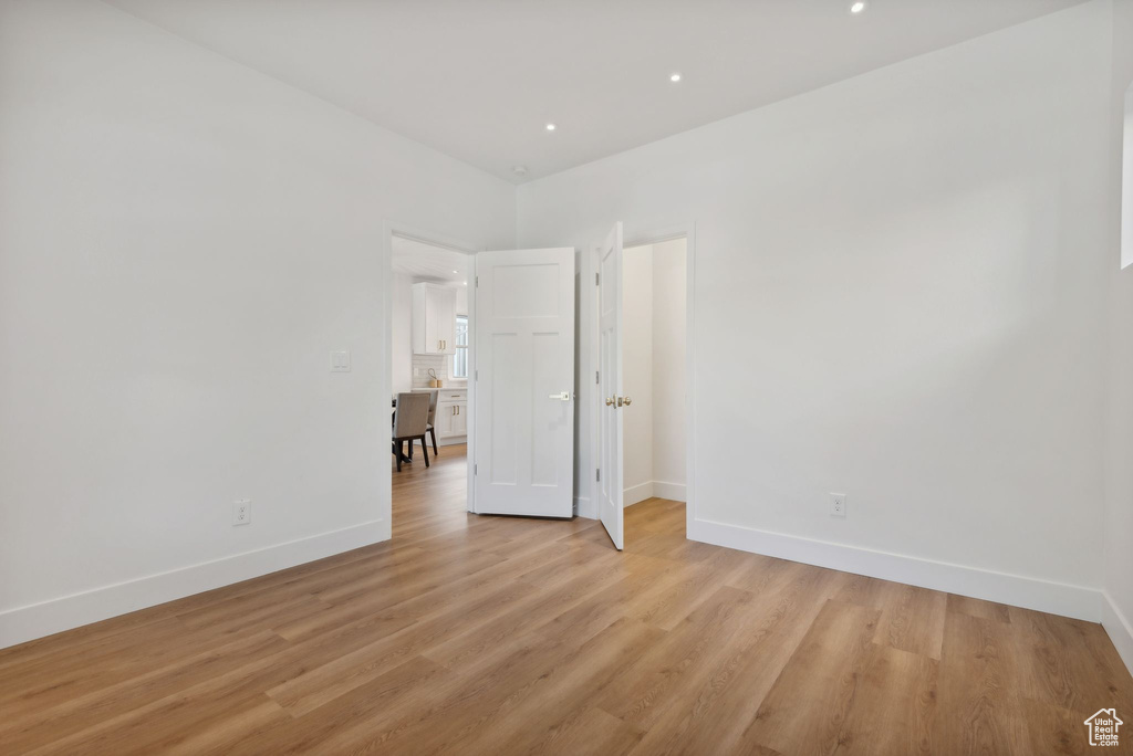 Unfurnished room featuring light hardwood / wood-style floors