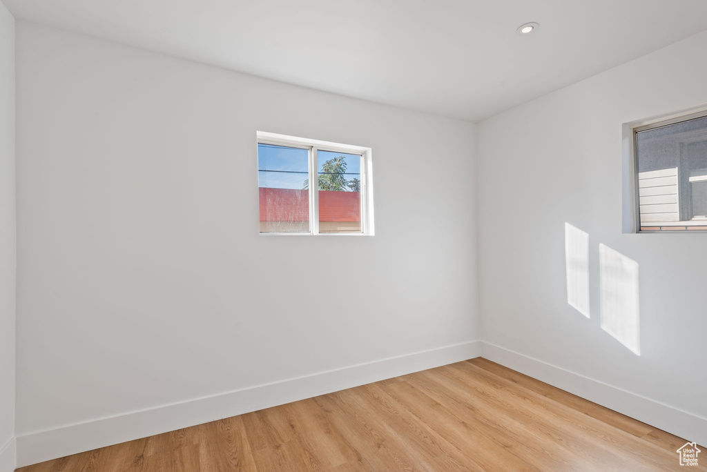 Unfurnished room with wood-type flooring