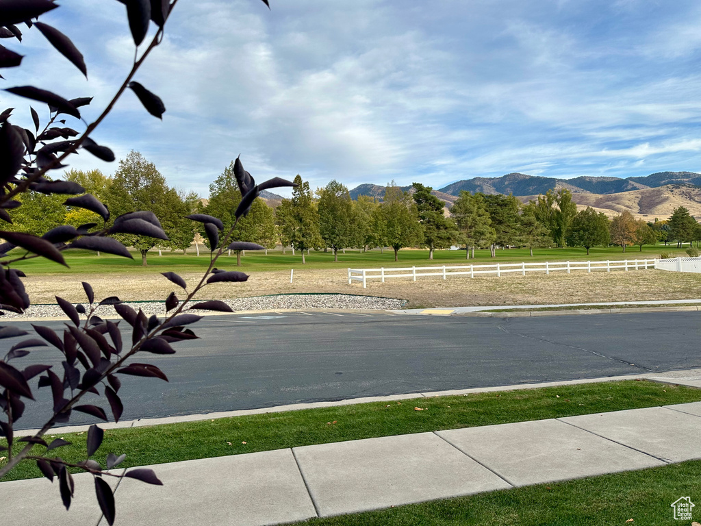 View of water feature with a mountain view and a rural view