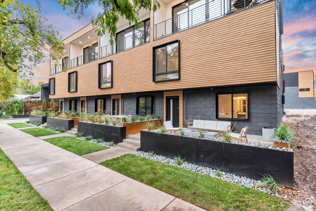 Contemporary home featuring a balcony