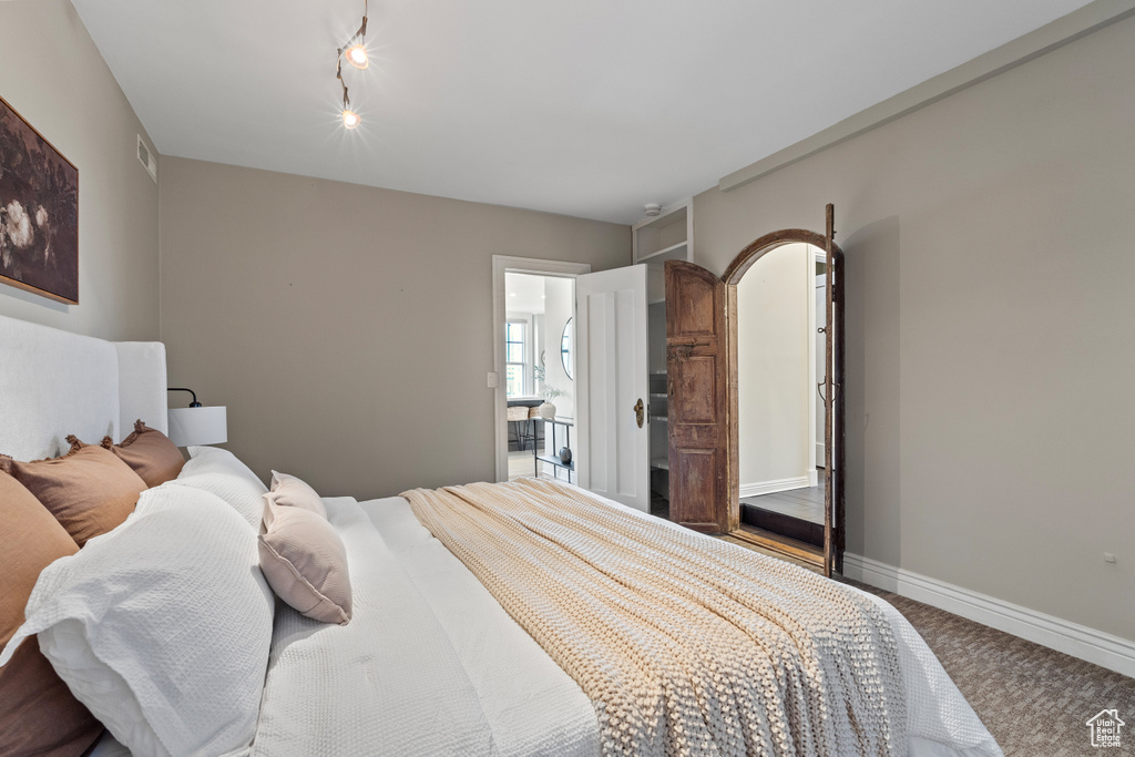 Bedroom with carpet