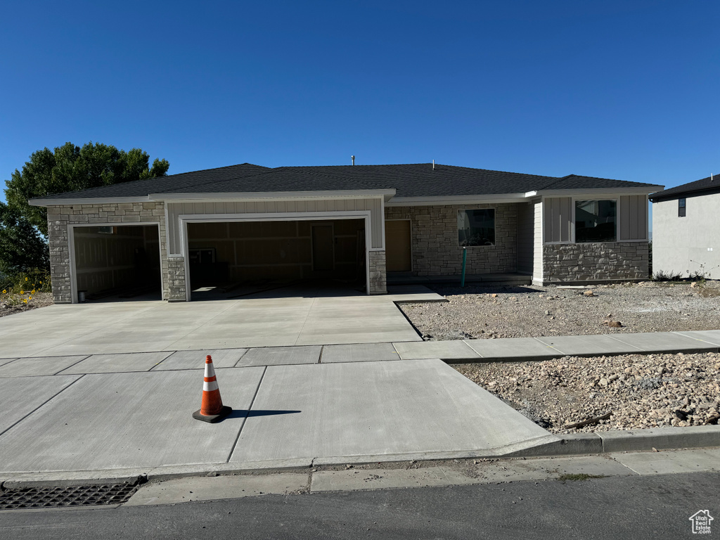 View of front facade with a garage