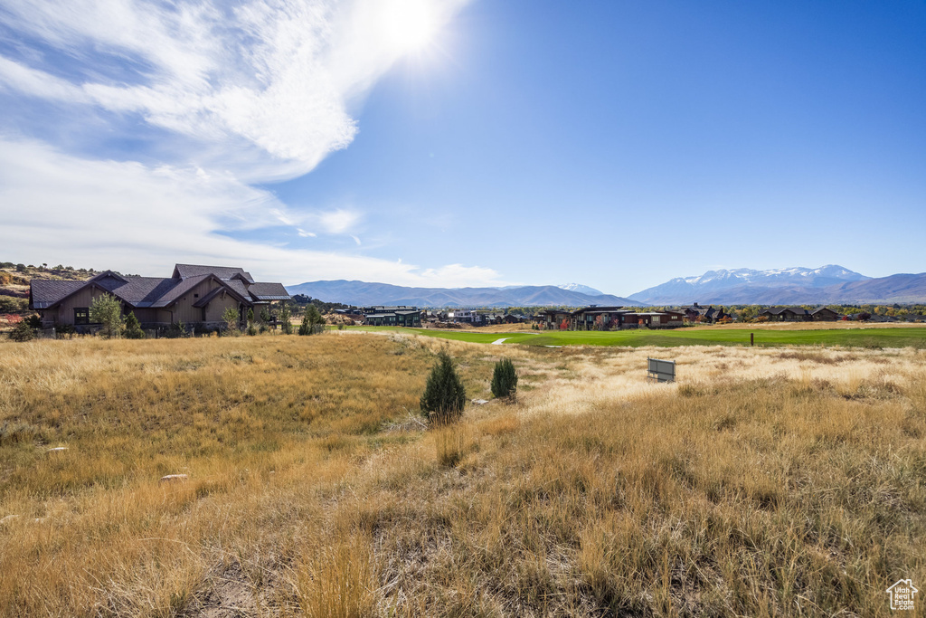 Property view of mountains with a rural view