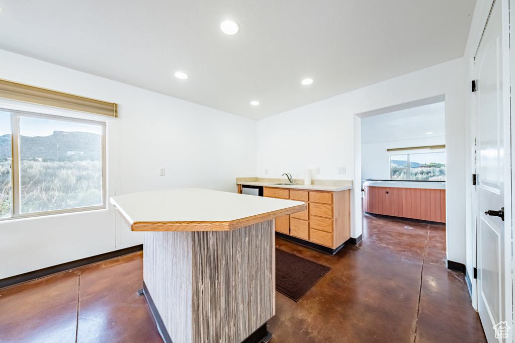 Kitchen with sink and a center island