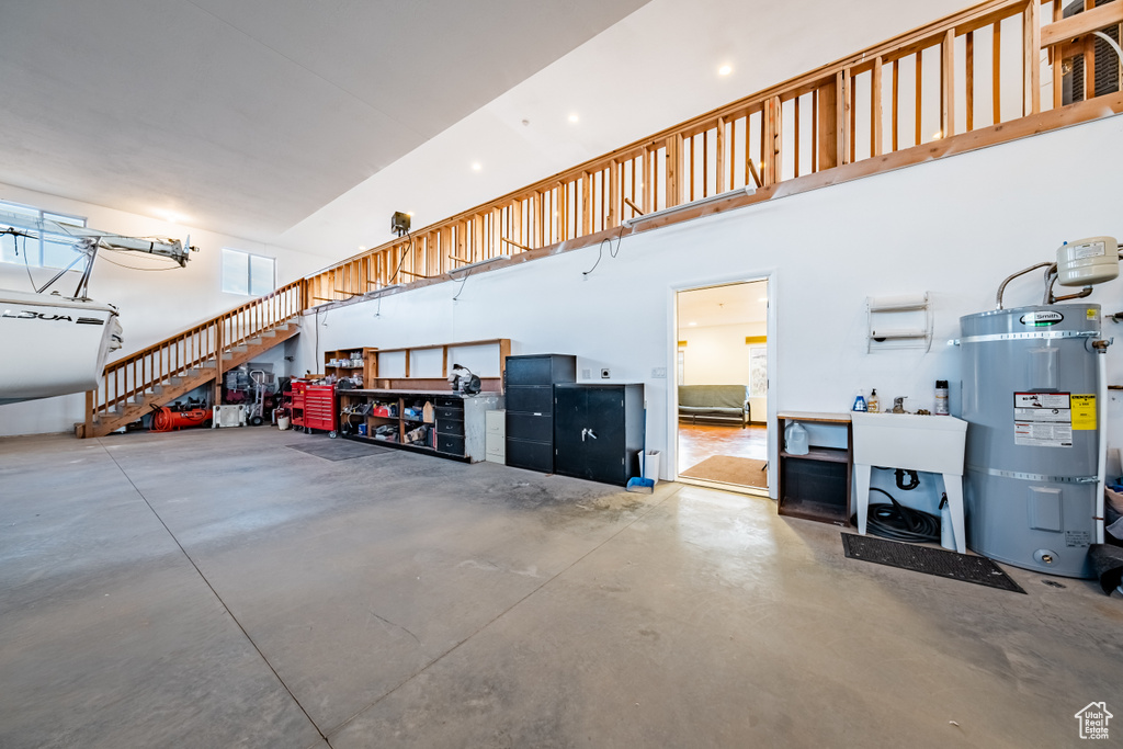 Garage with strapped water heater