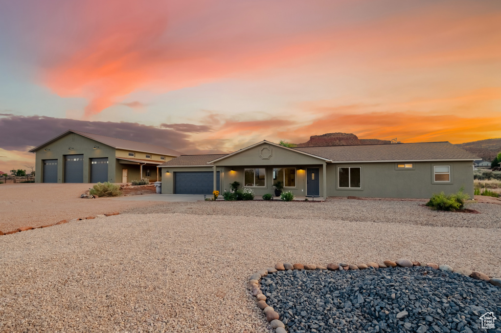 Ranch-style house featuring a garage