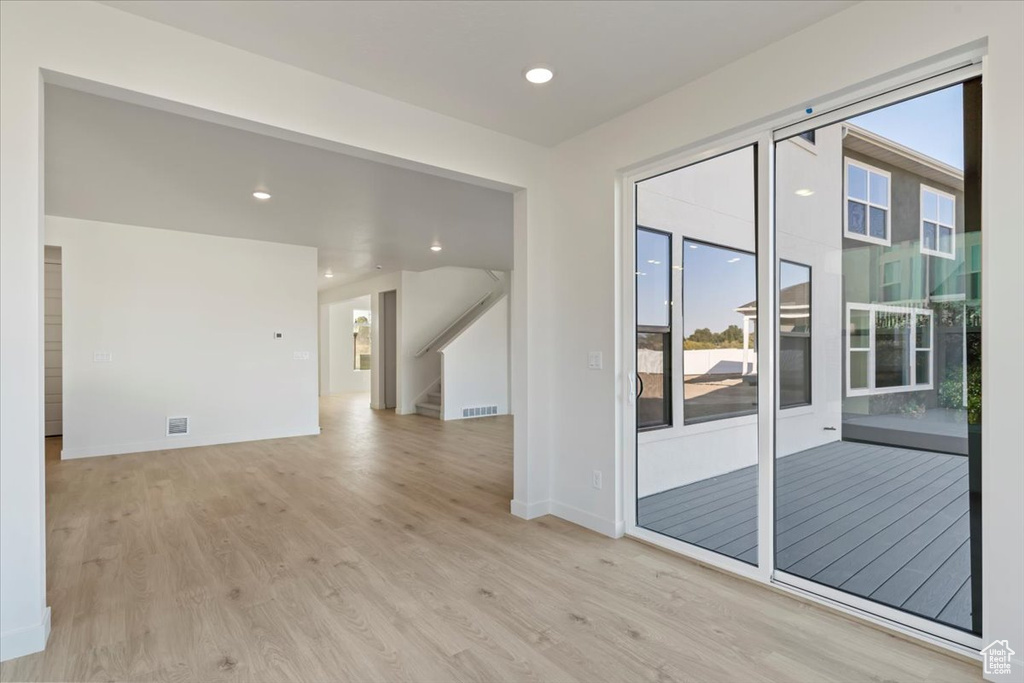 Spare room with light wood-type flooring