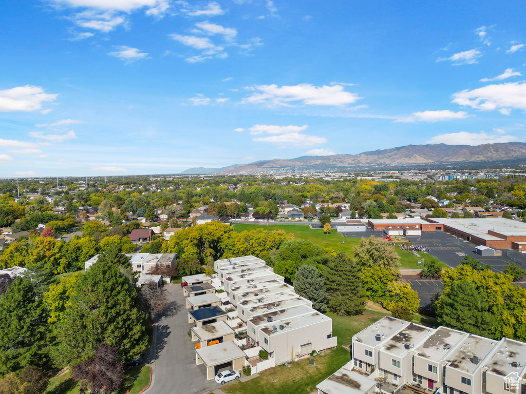 Birds eye view of property with a mountain view