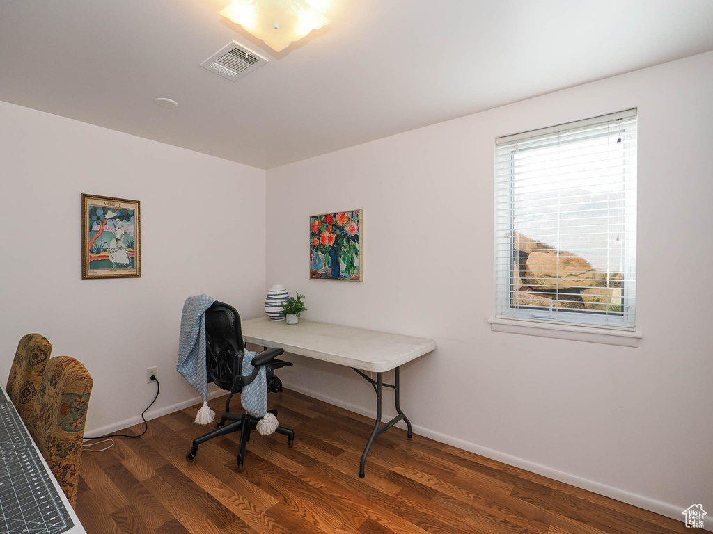 Office featuring dark hardwood / wood-style flooring