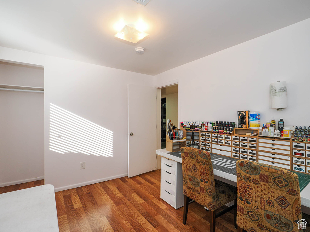 Office space featuring light hardwood / wood-style floors