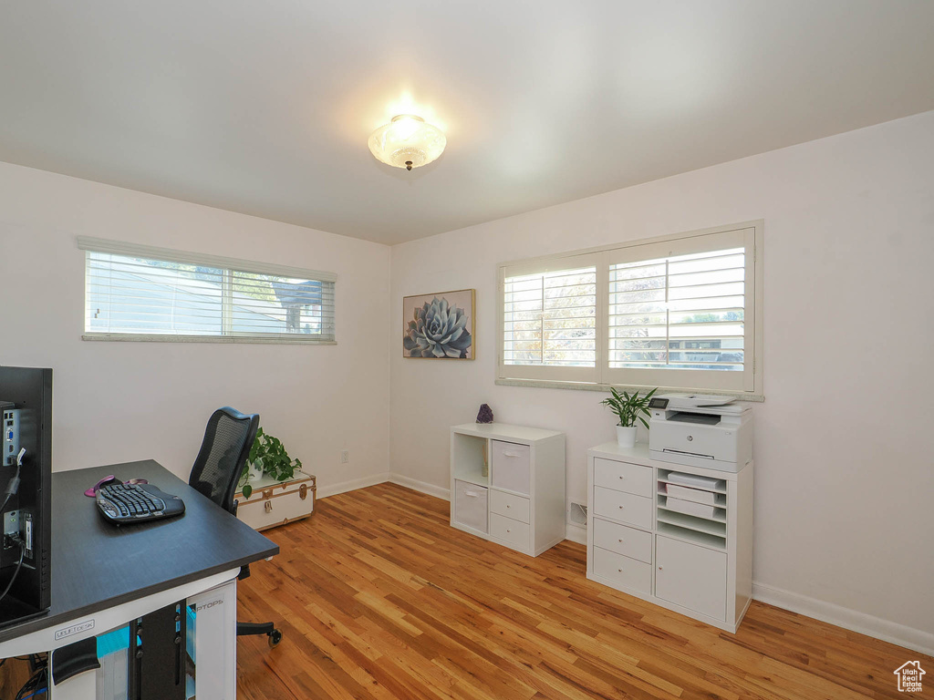 Office featuring light wood-type flooring