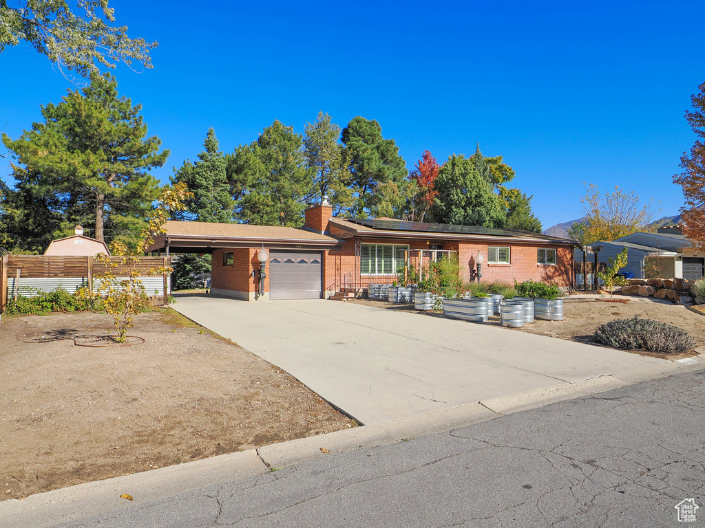 Single story home with a garage