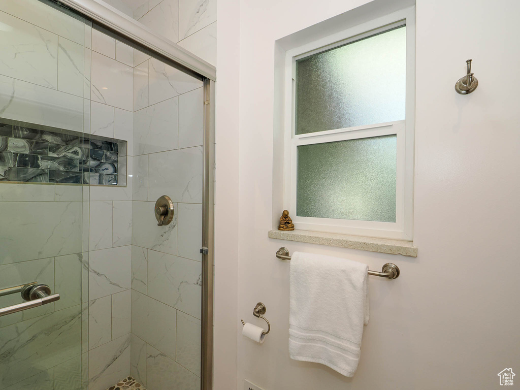 Bathroom with an enclosed shower