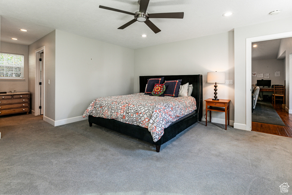 Bedroom featuring carpet floors and ceiling fan