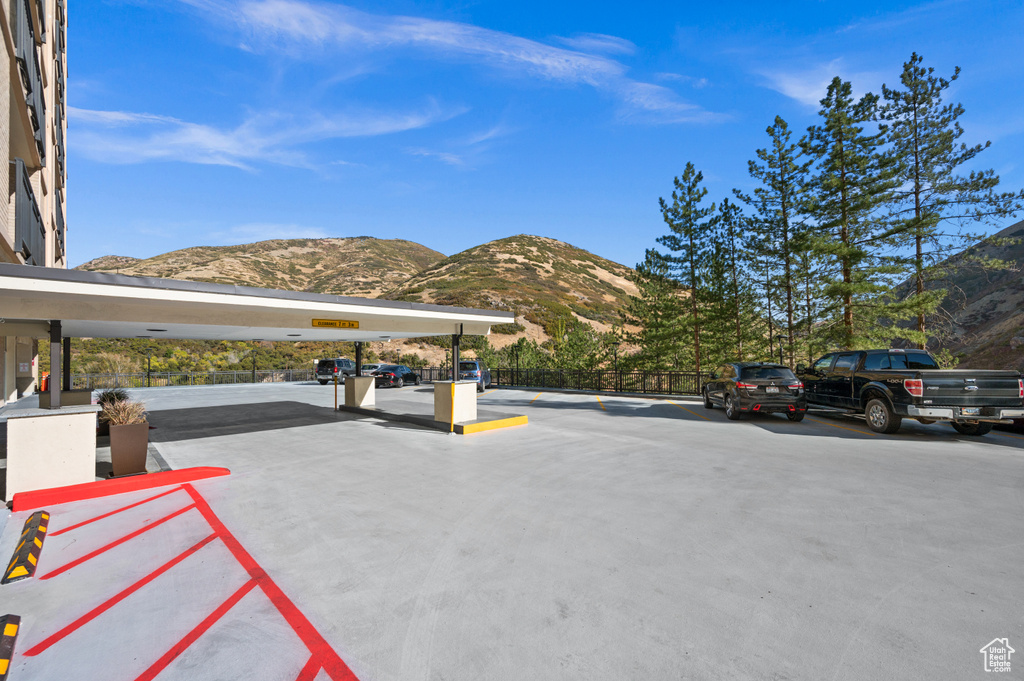 View of car parking with a mountain view