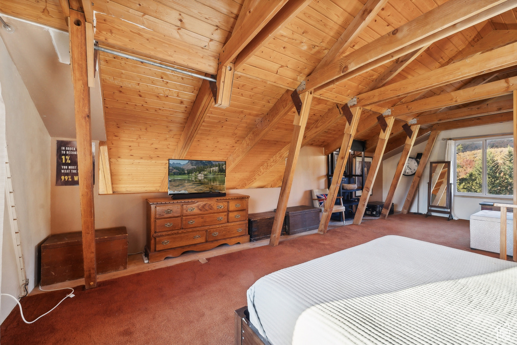 Bedroom featuring wood ceiling, lofted ceiling with beams, and dark carpet