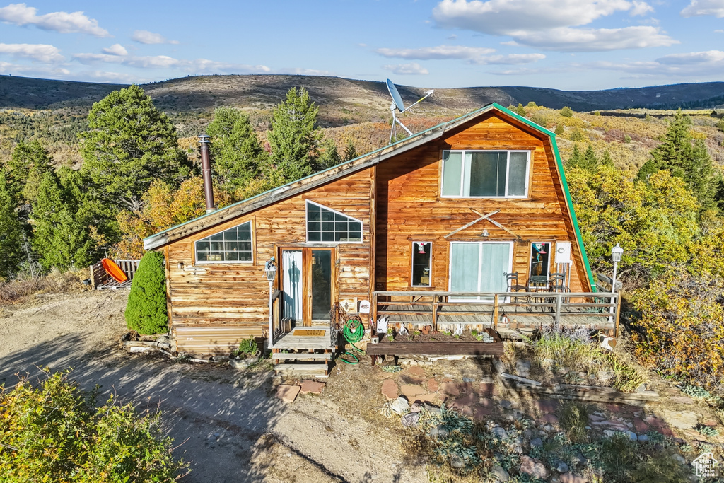 View of front of house featuring a mountain view