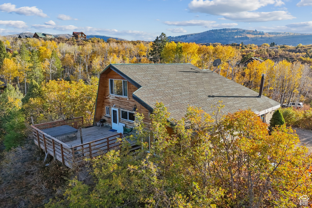 Birds eye view of property with a mountain view