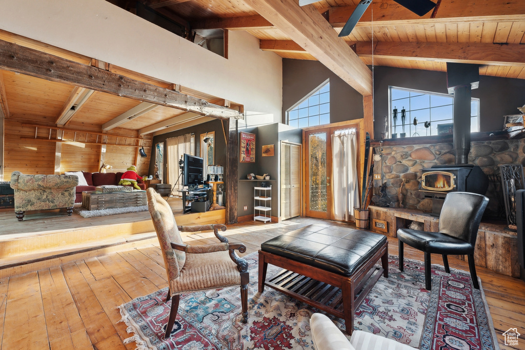 Living room featuring wood ceiling, hardwood / wood-style floors, and plenty of natural light