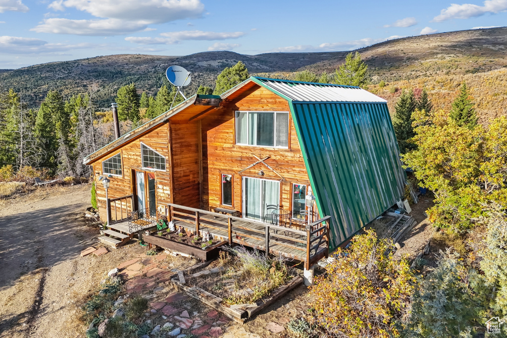 Exterior space featuring a mountain view