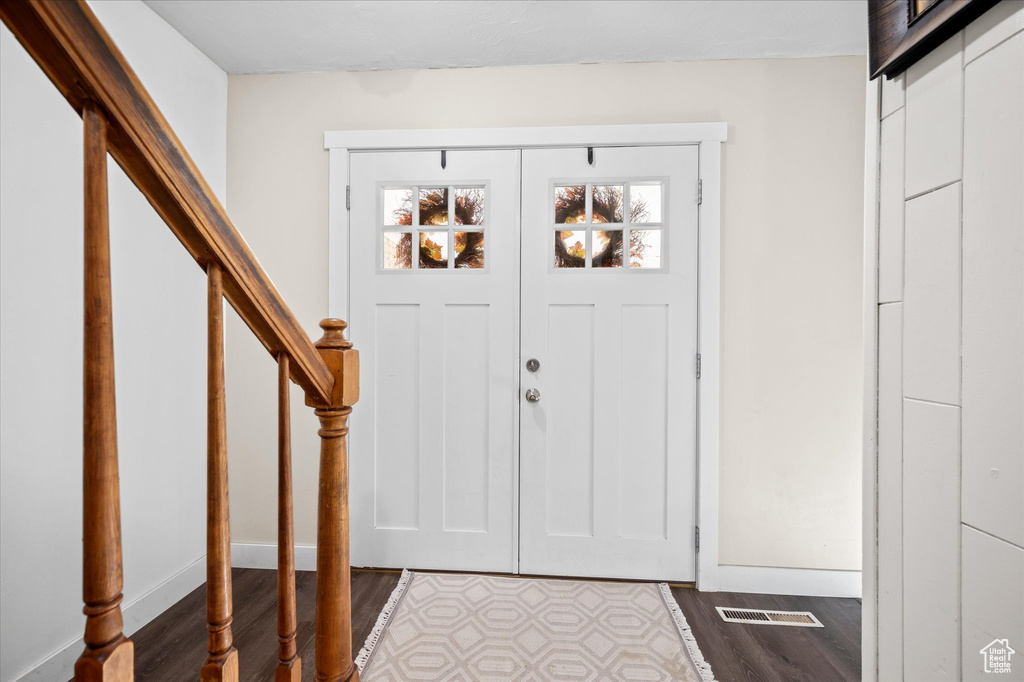 Entryway featuring dark hardwood / wood-style flooring