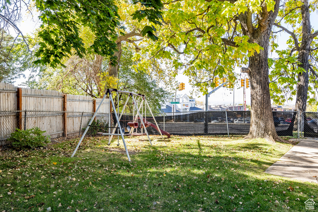 View of yard with a playground