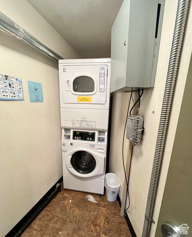 Laundry area featuring stacked washer / dryer