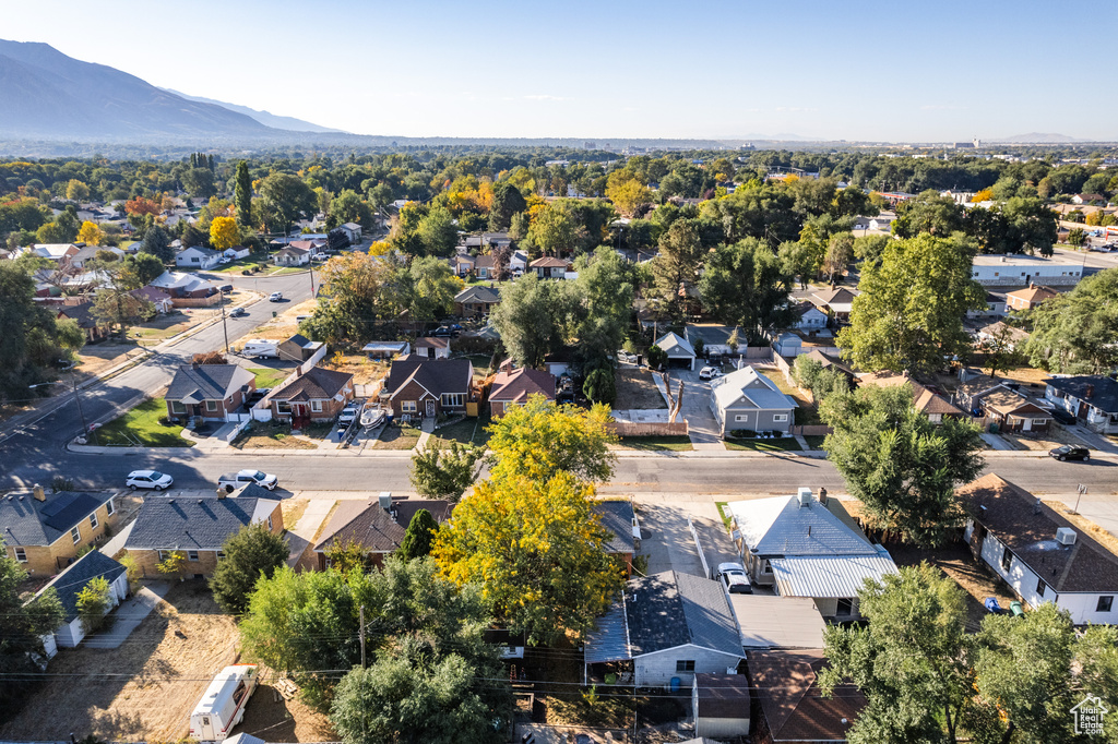 Birds eye view of property with a mountain view