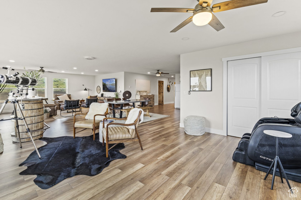 Living room with light hardwood / wood-style flooring